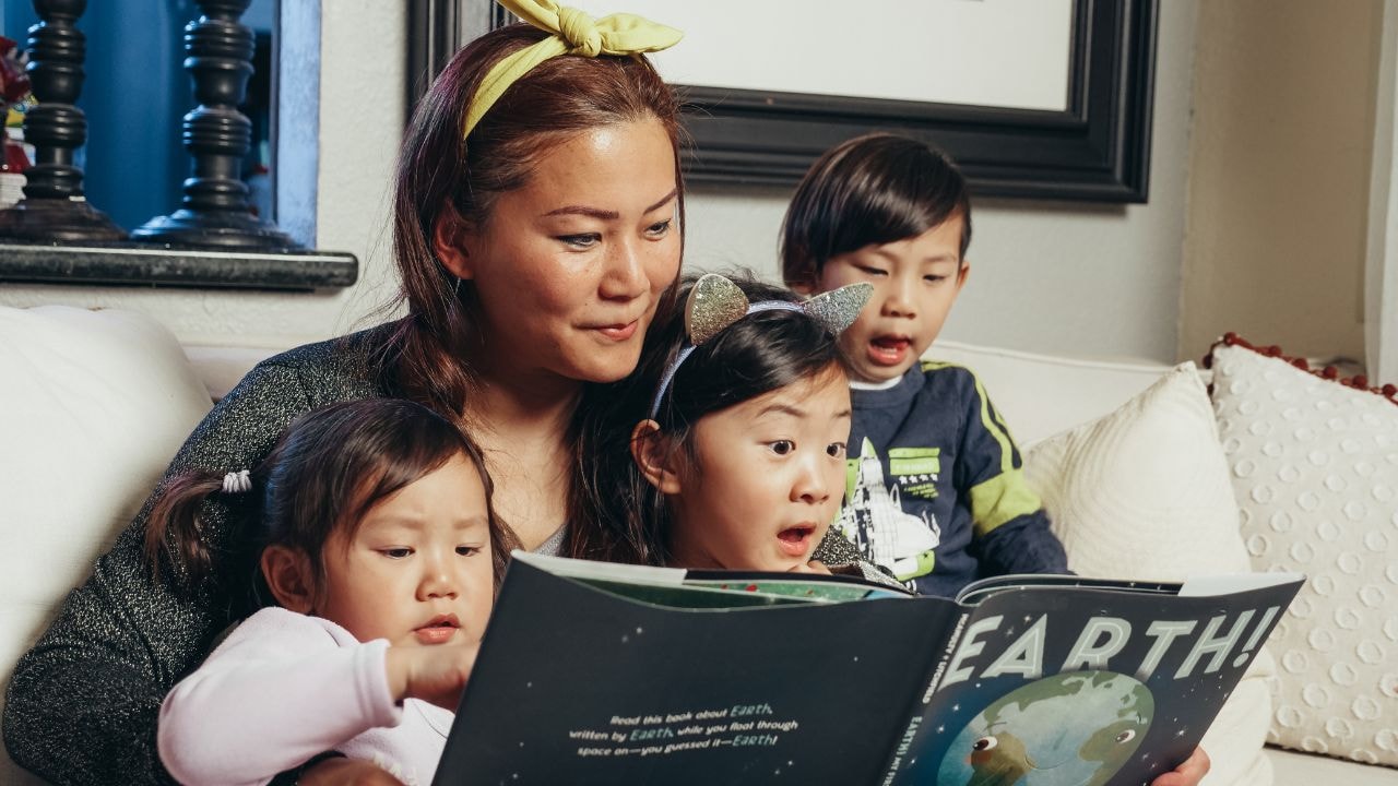 Family reading together, a cozy school holiday activity.